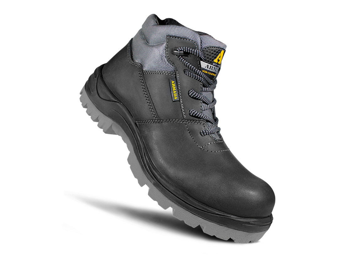 Botas de seguridad Armada color negro con cuello y suela en color gris.