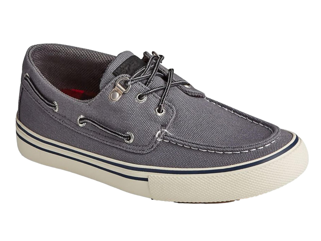 Zapato casual Sperry color gris con suela blanca y detalles en azul marino, estilo náutico.