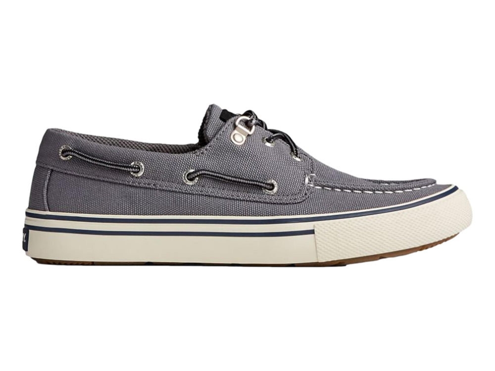 Zapato casual Sperry color gris con suela blanca y detalles en azul marino, estilo náutico.