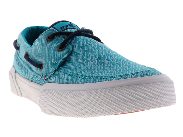 Zapato casual Sperry Soletide en color azul con textura, cordones oscuros y suela blanca.