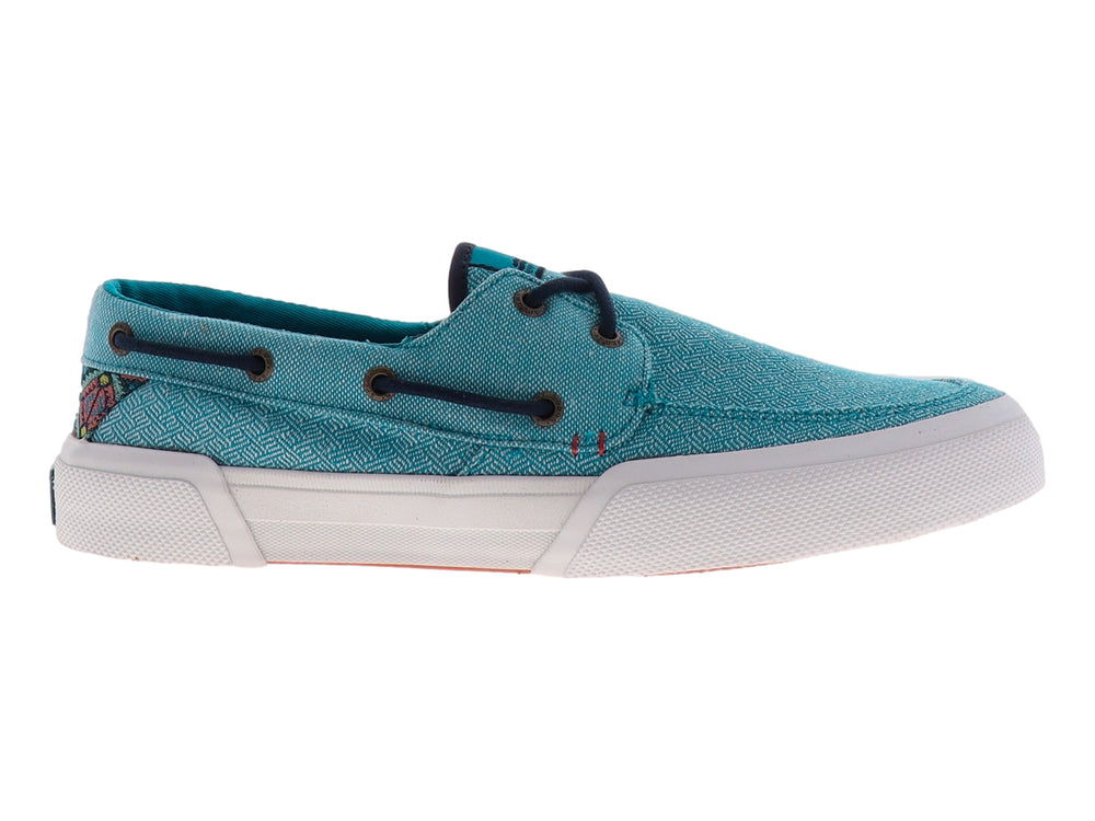 Zapato casual Sperry Soletide en color azul con textura, cordones oscuros y suela blanca.
