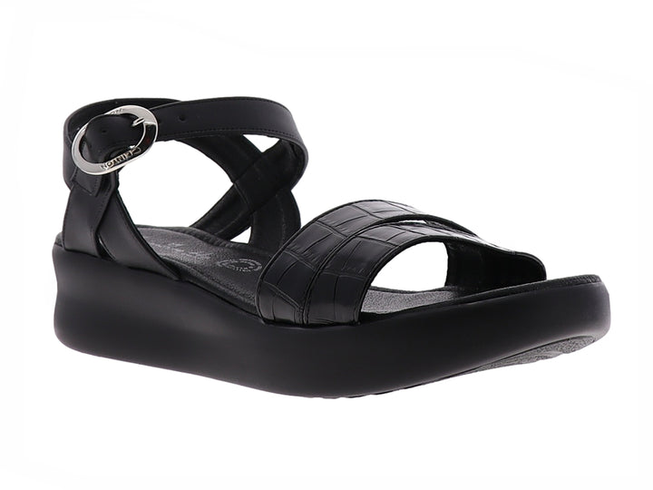 Sandalia negra de plataforma con correas texturizadas y hebilla plateada.