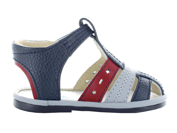Sandalias infantiles color azul marino con tiras en gris y rojo.