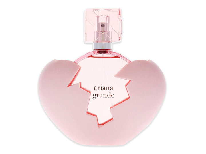 Perfume Ariana Grande Thank U Next en frasco con forma de corazón rosa y su caja correspondiente.