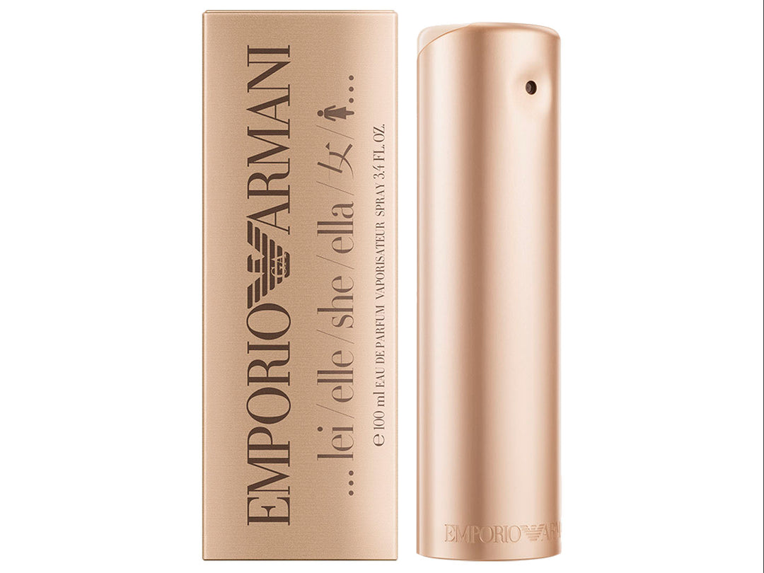 Perfume Emporio Armani Ella en color oro rosa, incluye frasco cilíndrico y caja rectangular.