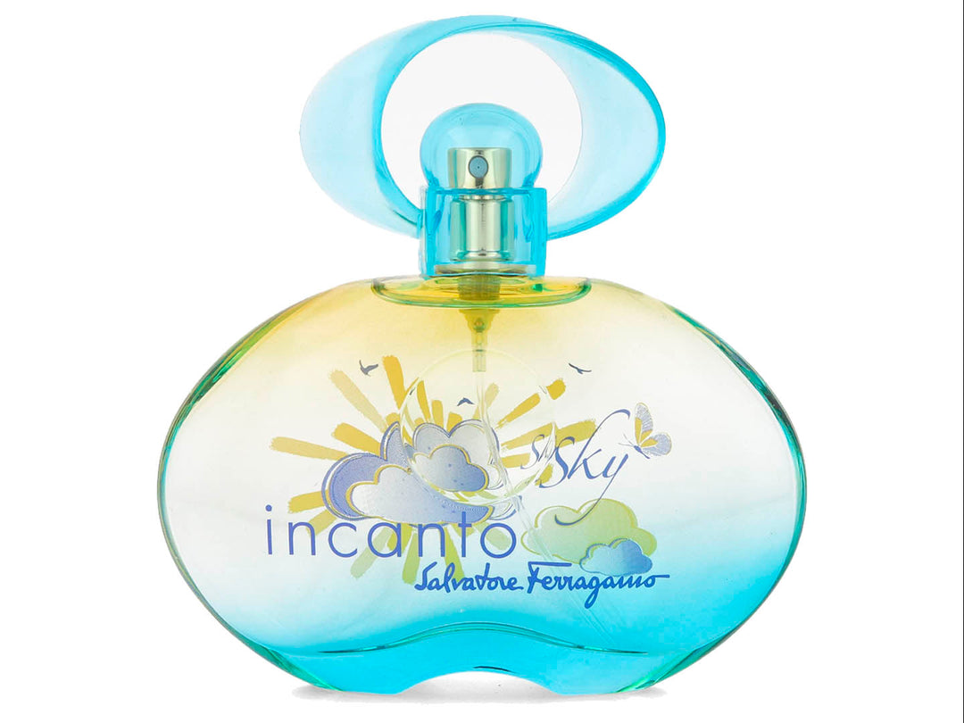 Perfume Salvatore Ferragamo Incanto Sky de 100ml con botella y caja en tonos azul y amarillo con diseño de nubes.