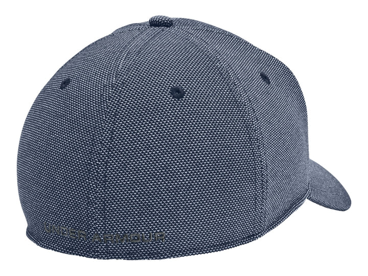 Gorra deportiva Under Armour en color azul marino con logotipo frontal en relieve y visera curva.