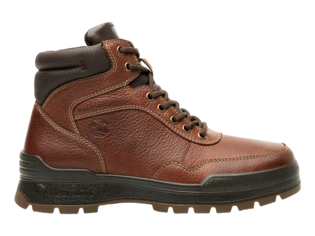 Bota de cuero color brandy con suela negra robusta y cordones.