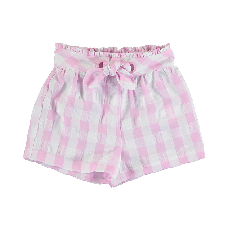 Short infantil a cuadros en color malva y blanco con un lazo decorativo en la cintura.