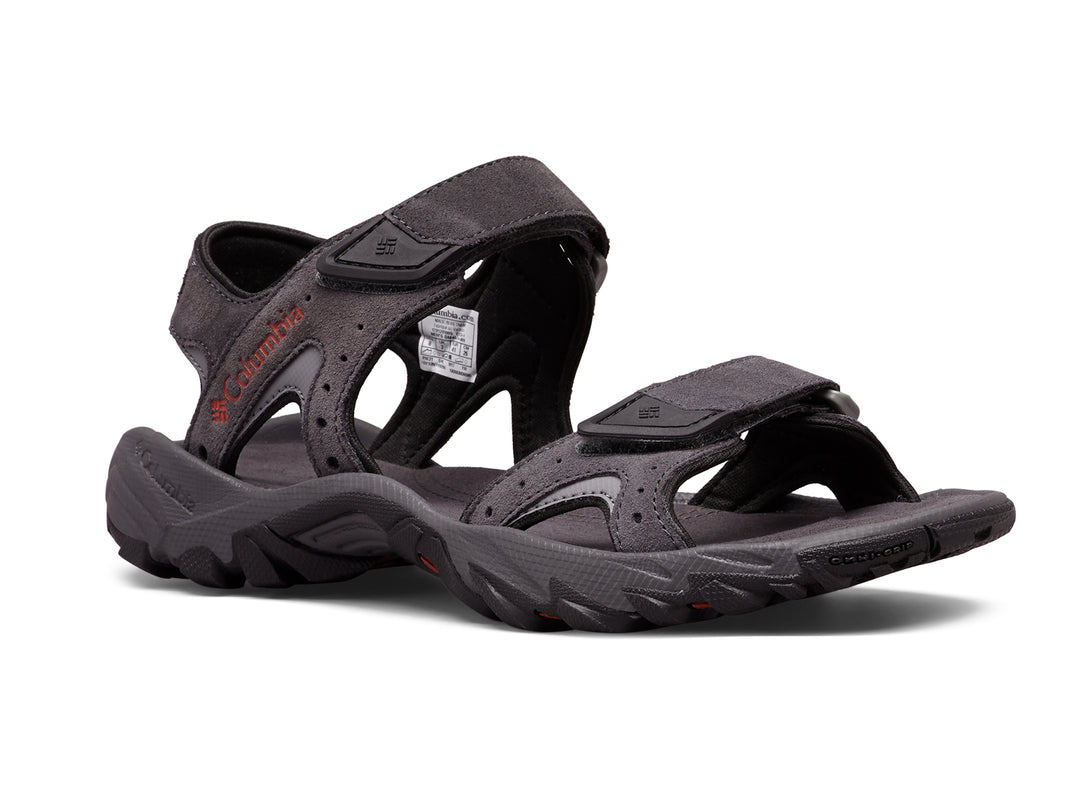 Sandalias Columbia color gris oscuro con correas ajustables y suela deportiva.