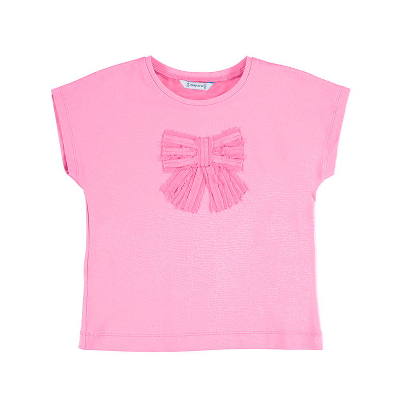 Camiseta color malva para niña con un moño decorativo en el pecho.