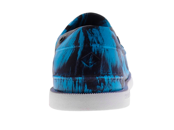 Zapato estilo clog Sperry azul marmoleado con suela blanca y perforaciones laterales.