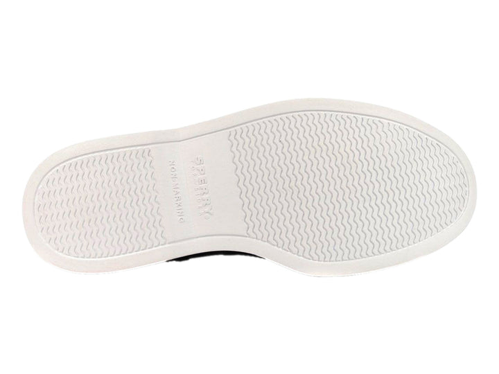 Zapato slip-on Sperry color negro marmoleado con suela blanca y perforaciones laterales.