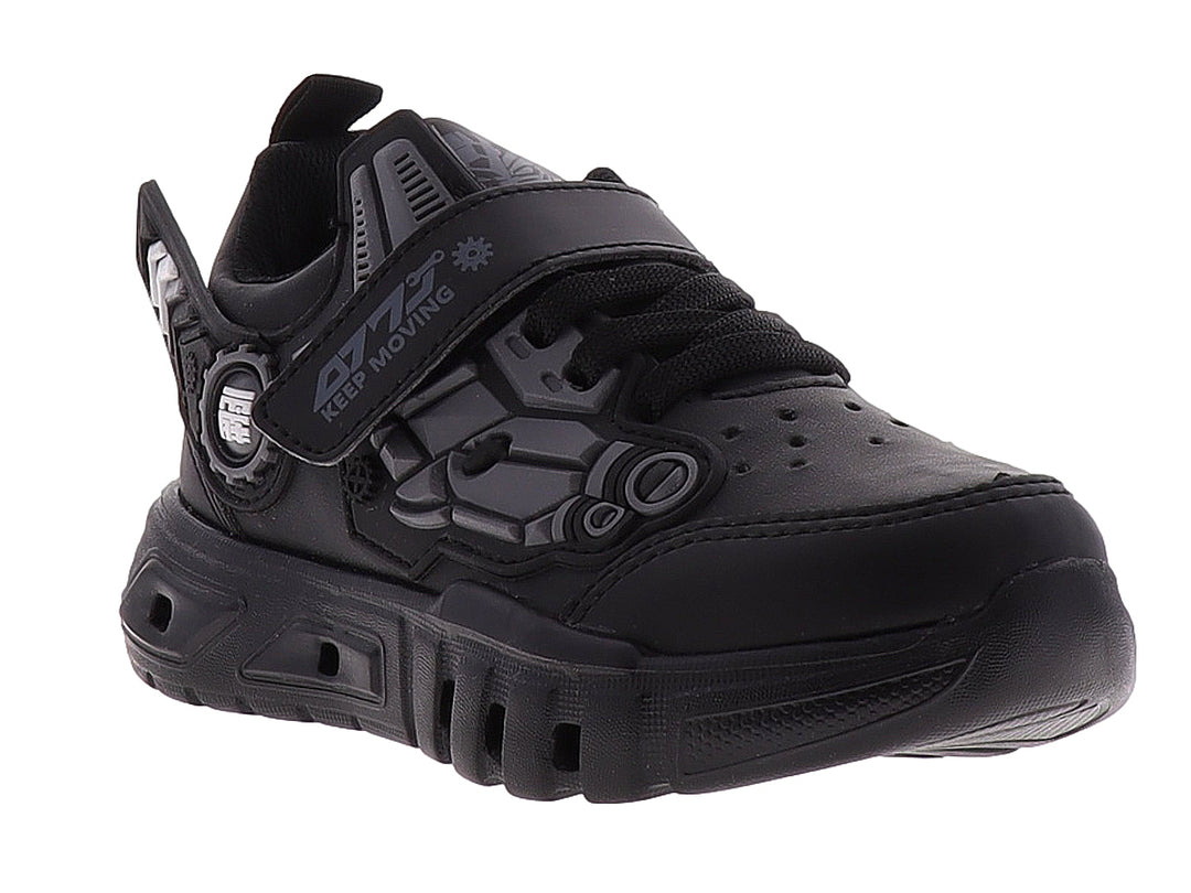 Zapato deportivo infantil color negro con diseño robótico lateral y cierre de velcro.