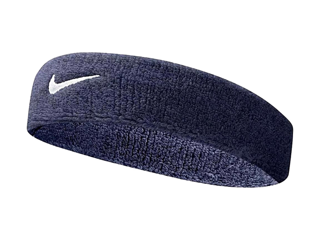 Banda deportiva Nike color azul oscuro con logotipo Swoosh en blanco.
