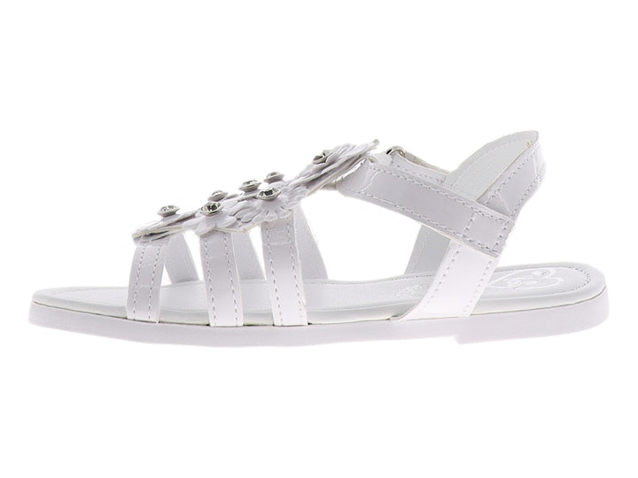 Sandalias blancas para niña con decoraciones florales y detalles brillantes en la parte superior.