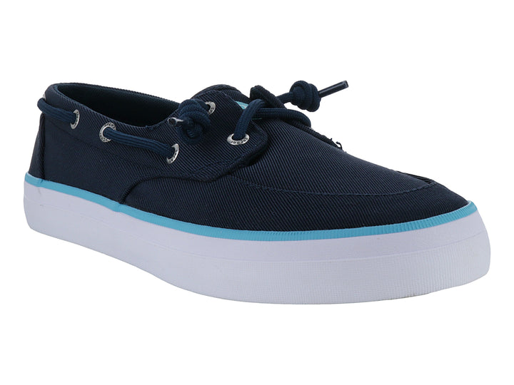 Zapato náutico Sperry azul marino con suela blanca y una franja decorativa en azul claro.