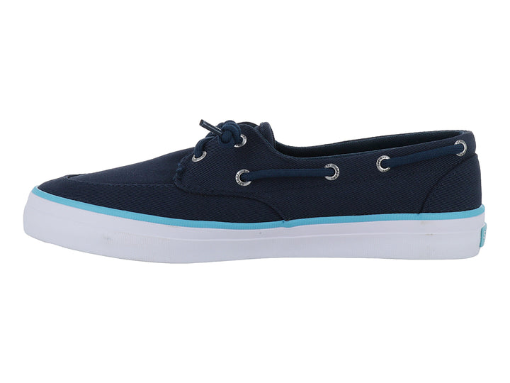 Zapato náutico Sperry azul marino con suela blanca y una franja decorativa en azul claro.