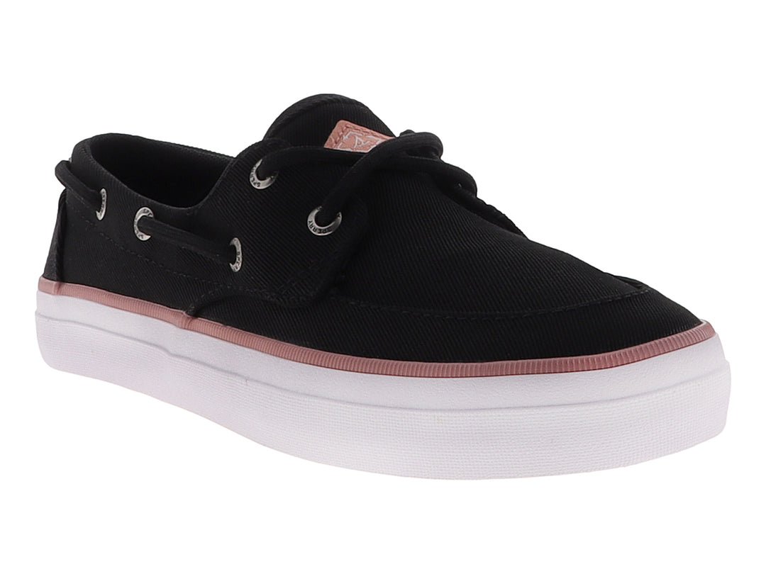 Zapato náutico Sperry de tela negra con franja rosa y suela blanca.