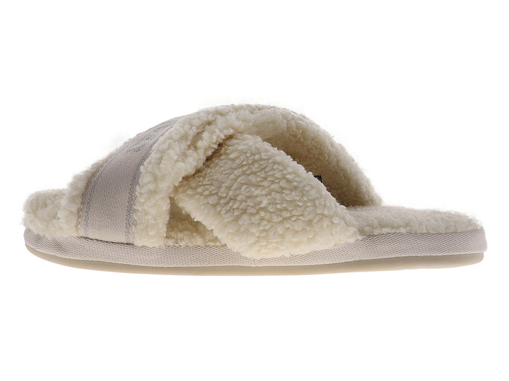 Pantufla amarilla de Tommy Hilfiger con textura de peluche y banda superior con logotipo.