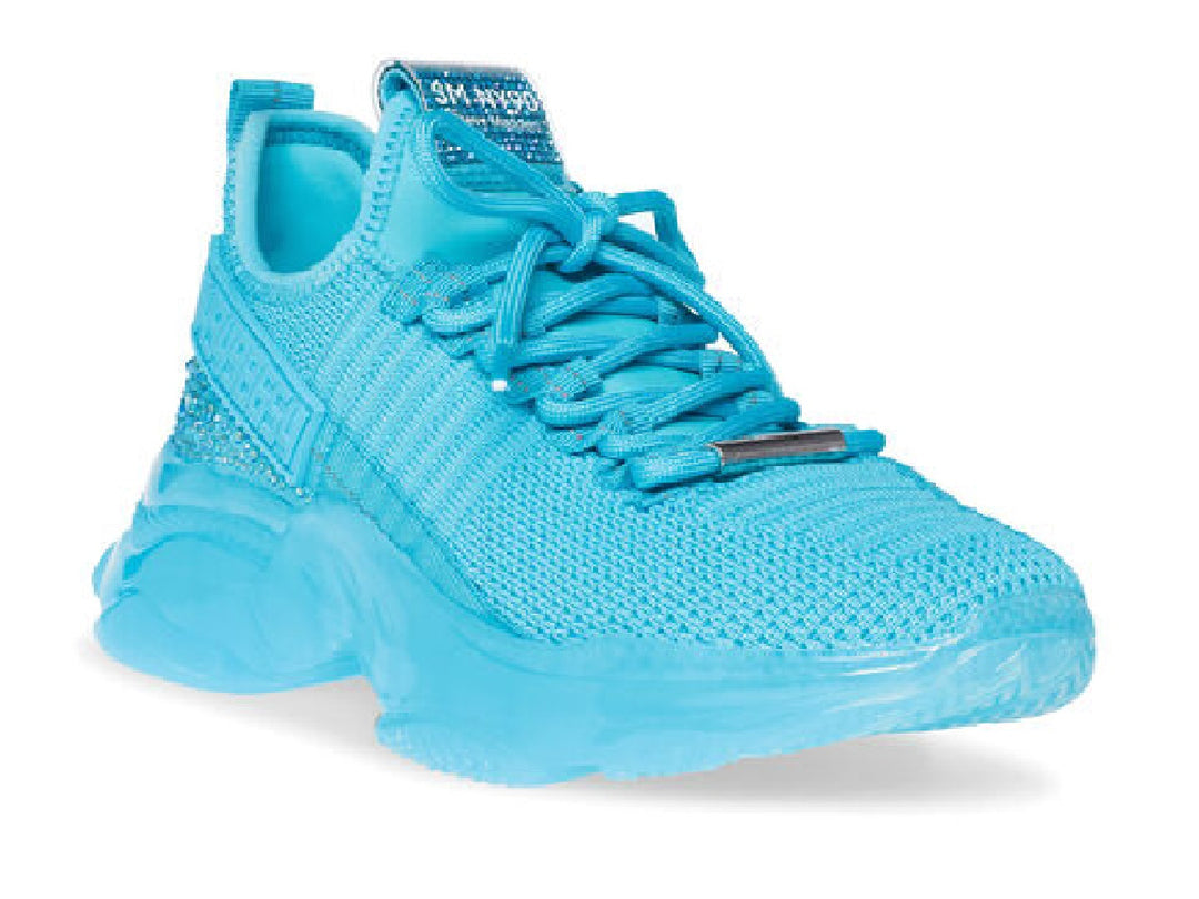 Tenis Steve Madden Maxill en color azul bright aqua con suela de plataforma y acabado tejido.