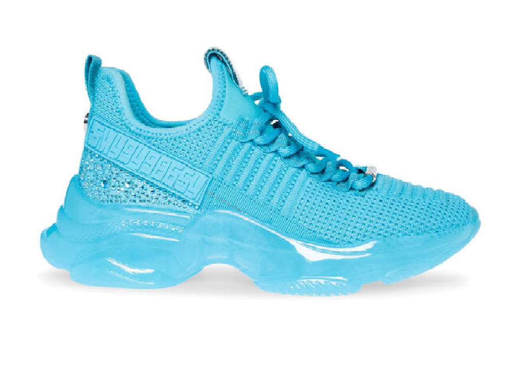Tenis Steve Madden Maxill en color azul bright aqua con suela de plataforma y acabado tejido.