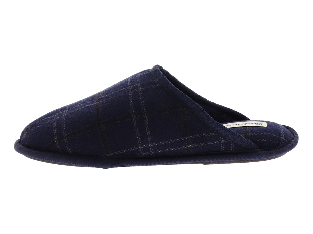 Pantufla cerrada de color azul marino con estampado de cuadros y textura suave.