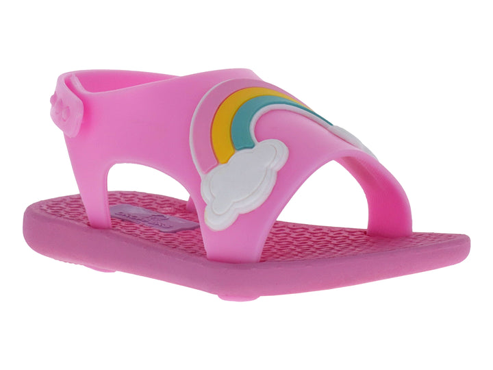 Sandalia infantil color rosa con detalle de arcoíris y nube blanca en la parte superior.