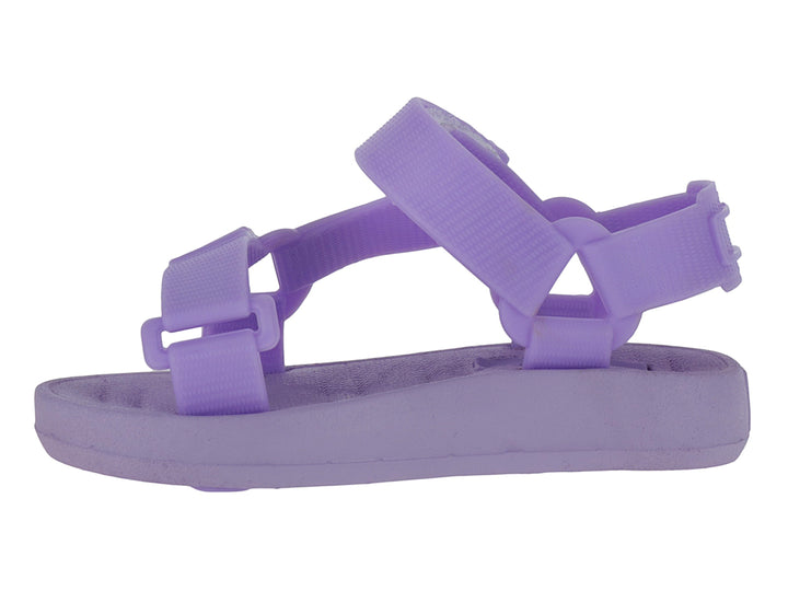 Sandalia infantil de color lavanda con correas ajustables y suela plana.