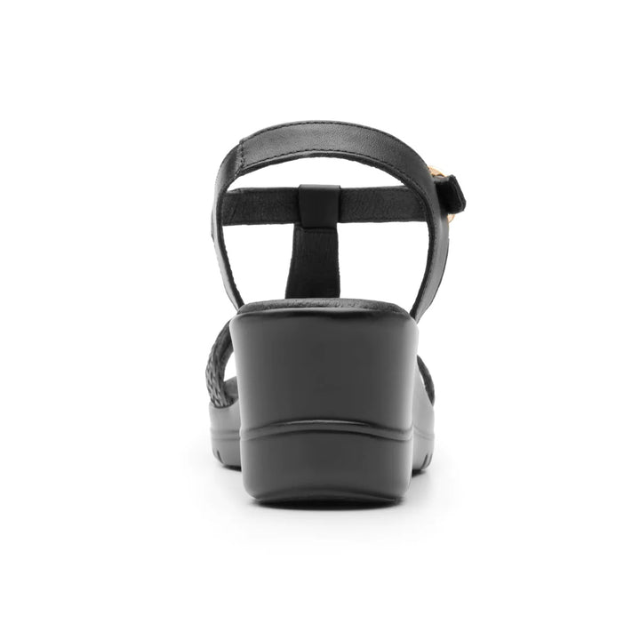 Sandalia negra Flexi Emily para mujer con plataforma y detalle trenzado en la parte frontal.