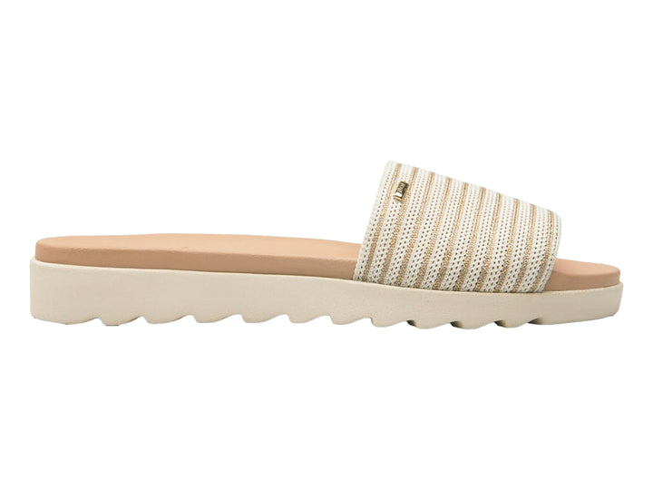Sandalia Flexi color beige con correa de rayas y suela blanca.