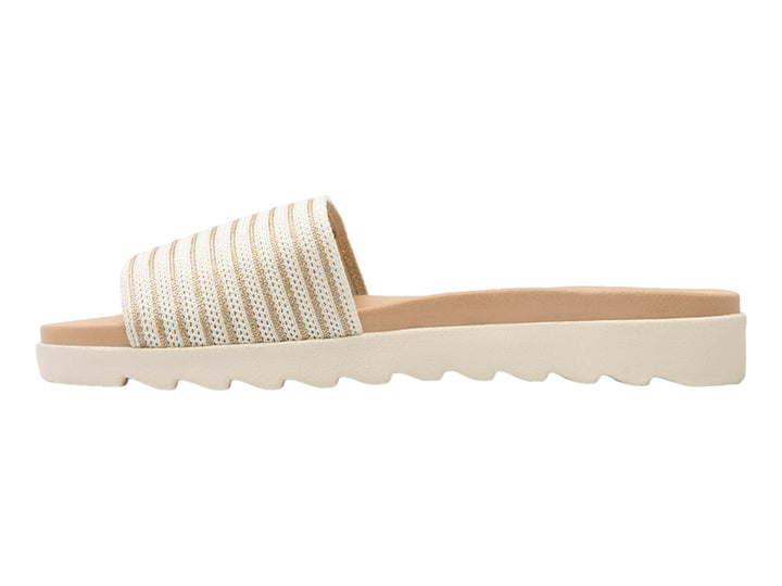 Sandalia Flexi color beige con correa de rayas y suela blanca.