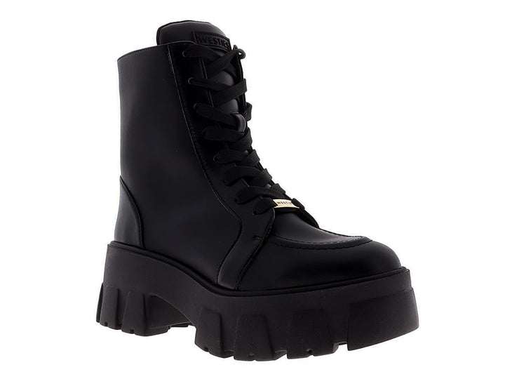 Bota negra de plataforma con suela track y agujetas para mujer, marca Westies.