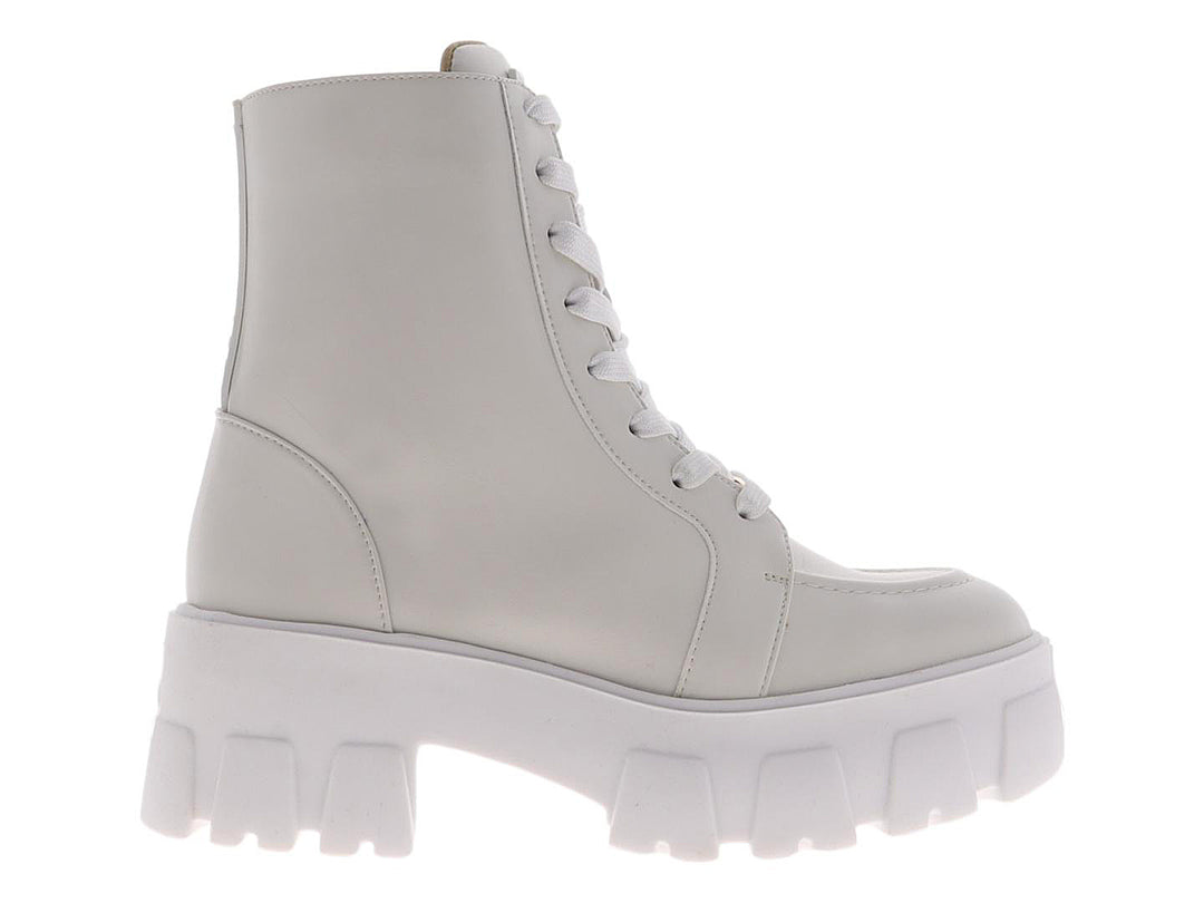 Bota de combate color ivory con suela de plataforma blanca y agujetas.