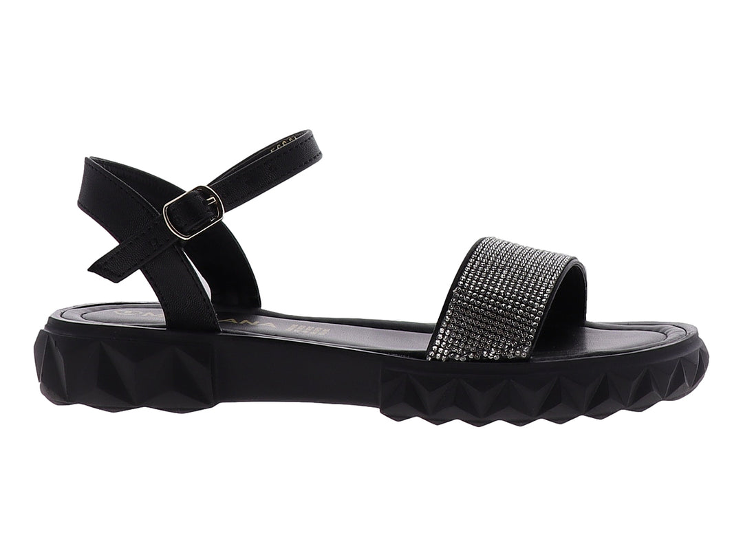 Sandalias negras para niña con plataforma dentada y tira frontal plateada brillante con cierre de hebilla.