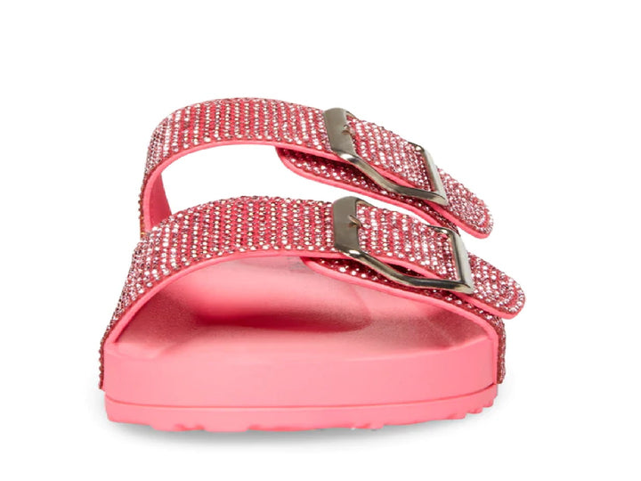 Sandalias rosa con correas de pedrería brillante y hebillas doradas.