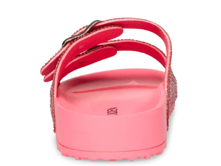 Sandalias rosa con correas de pedrería brillante y hebillas doradas.