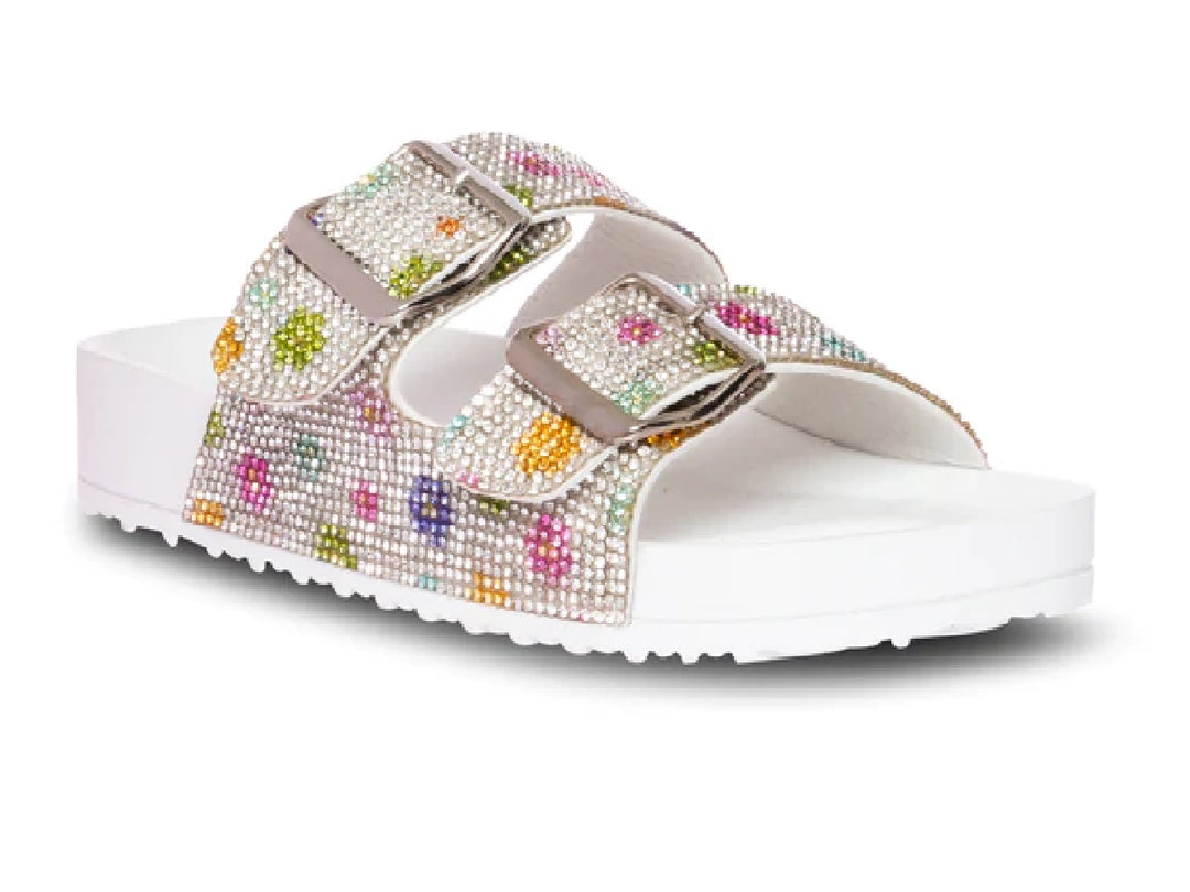 Sandalias blancas Steve Madden con correas decoradas con cristales multicolores y hebillas plateadas.
