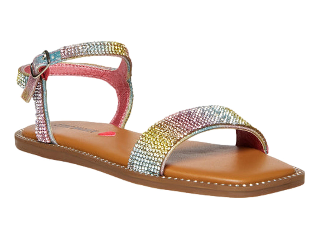 Sandalia plana para niña con correas decoradas con brillantes multicolores y suela marrón.