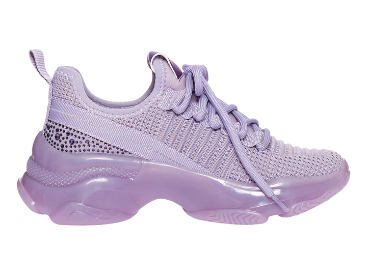 Tenis deportivos Steve Madden Jmaxim en color lila con suela gruesa y cuerpo de tela tejida.