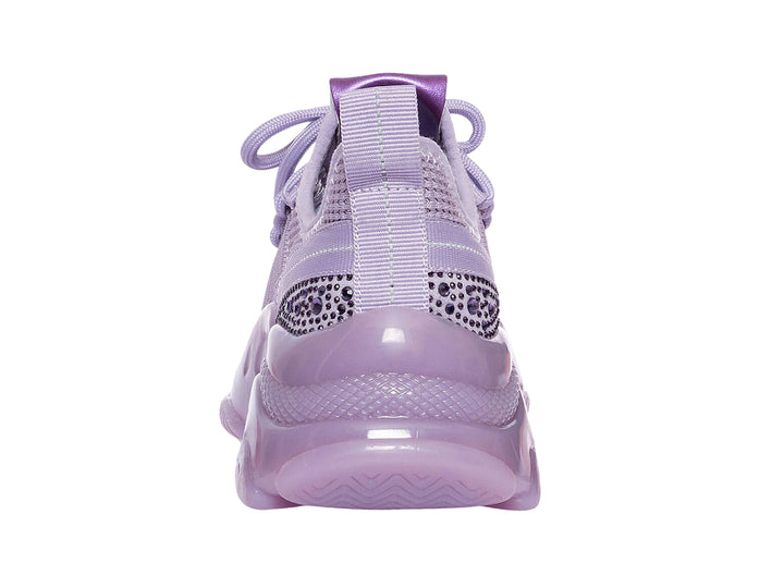 Tenis deportivos Steve Madden Jmaxim en color lila con suela gruesa y cuerpo de tela tejida.