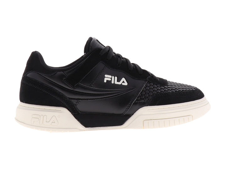 Tenis FILA color negro con suela color crema, diseño deportivo casual.
