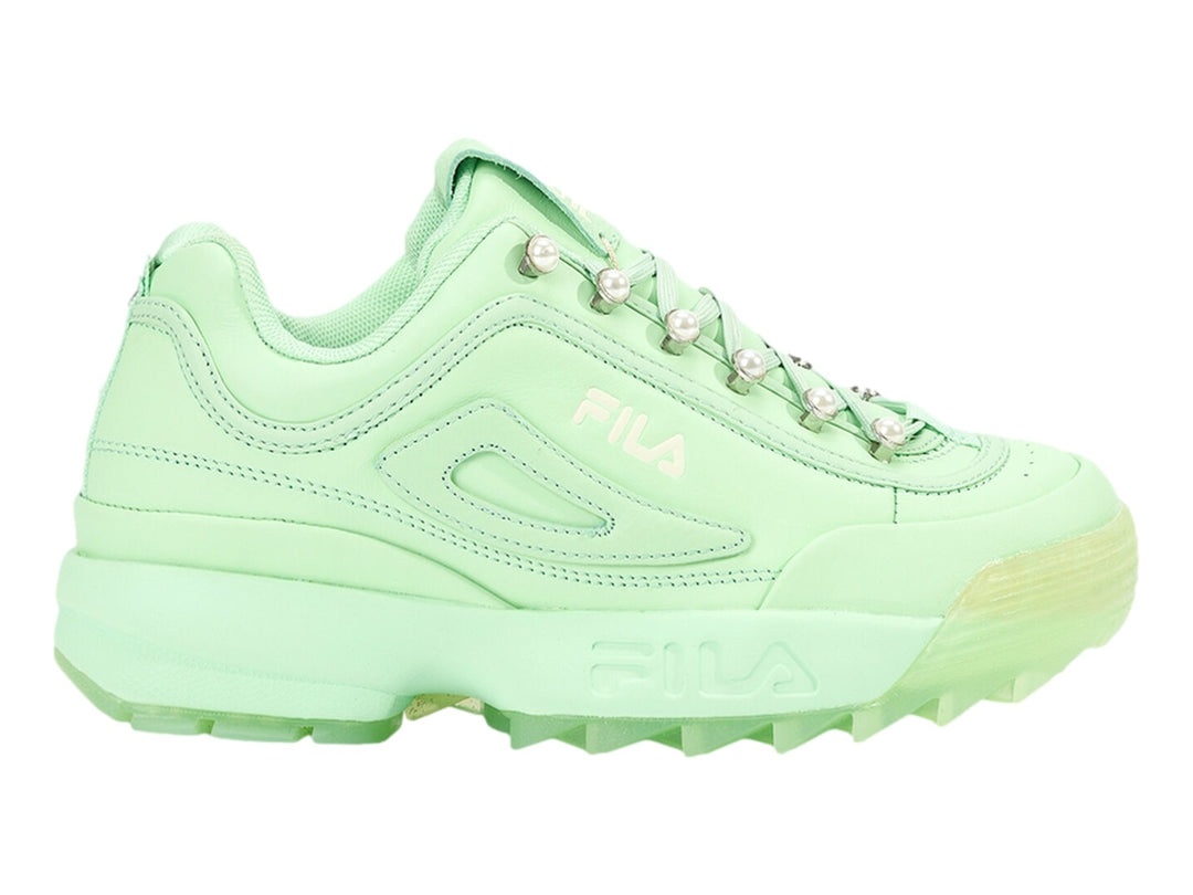 Tenis FILA Disruptor Zero Pearl en color verde menta con detalles de perlas en las agujetas y suela robusta.