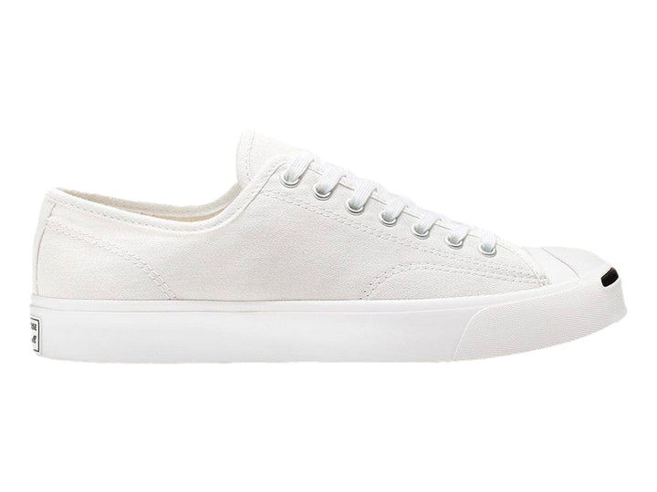 Tenis Converse Jack Purcell blancos de lona con suela blanca y punta redondeada.
