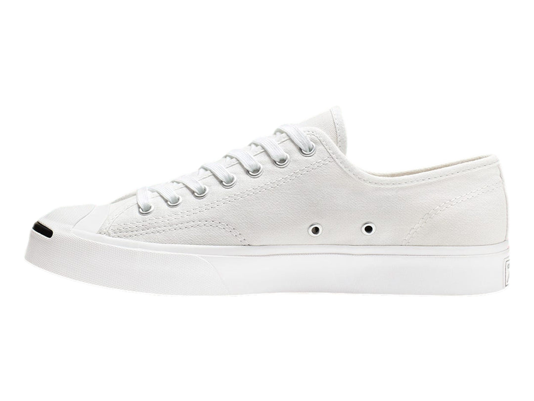Tenis Converse Jack Purcell blancos de lona con suela blanca y punta redondeada.