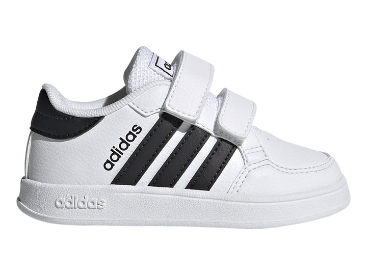 Tenis Adidas Breaknet I para niño en color blanco con tres franjas negras y cierre de velcro.