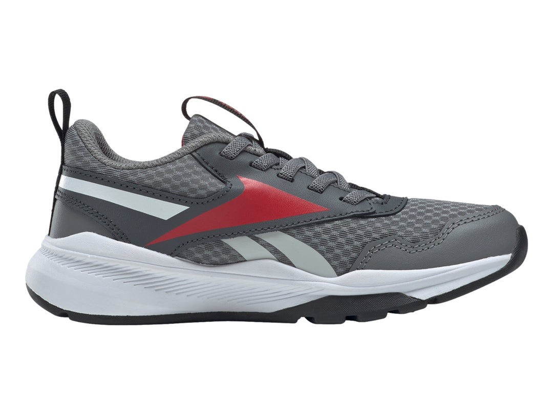 Tenis deportivos Reebok color gris con detalles en rojo y blanco, vista lateral.
