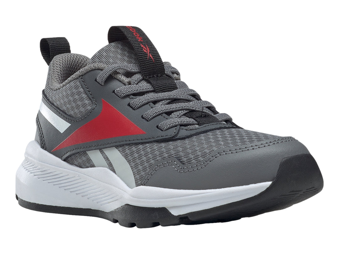Tenis deportivos Reebok color gris con detalles en rojo y blanco, vista lateral.