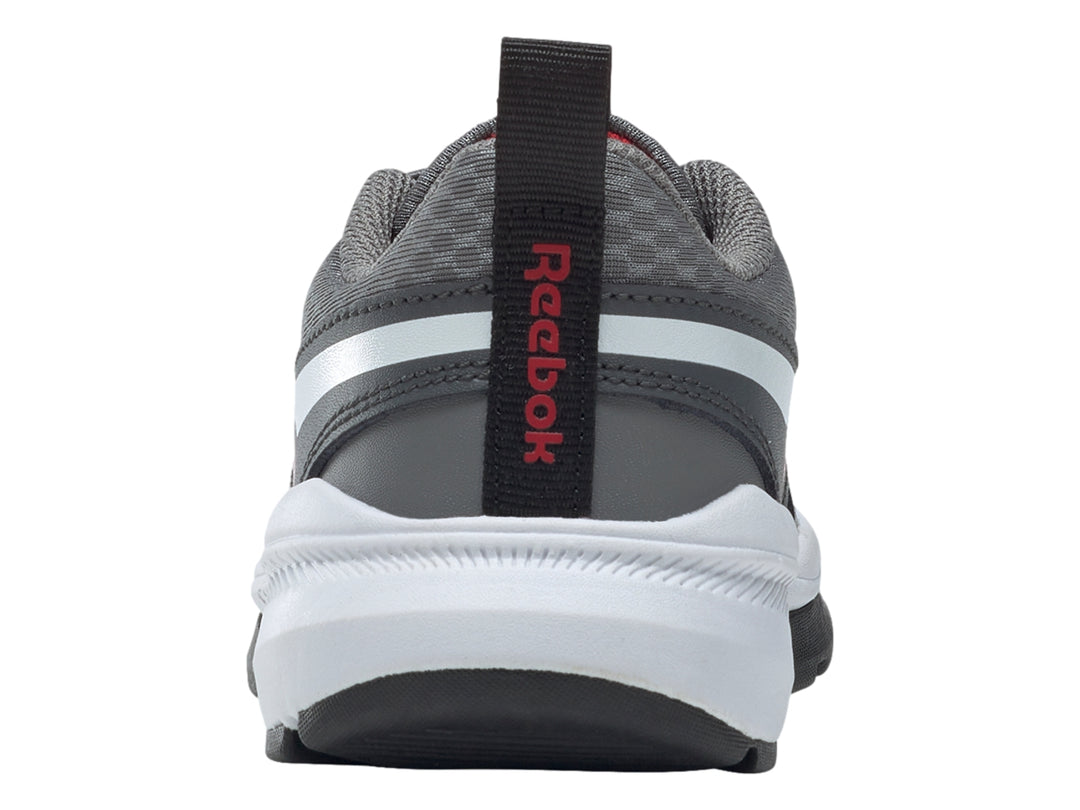 Tenis deportivos Reebok color gris con detalles en rojo y blanco, vista lateral.