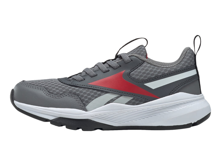 Tenis deportivos Reebok color gris con detalles en rojo y blanco, vista lateral.